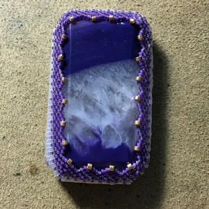 purple faceted stone wrk 8