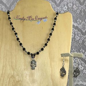 Black Gemstones and Swarovski Crystals with a Sugar Skull Center Charm